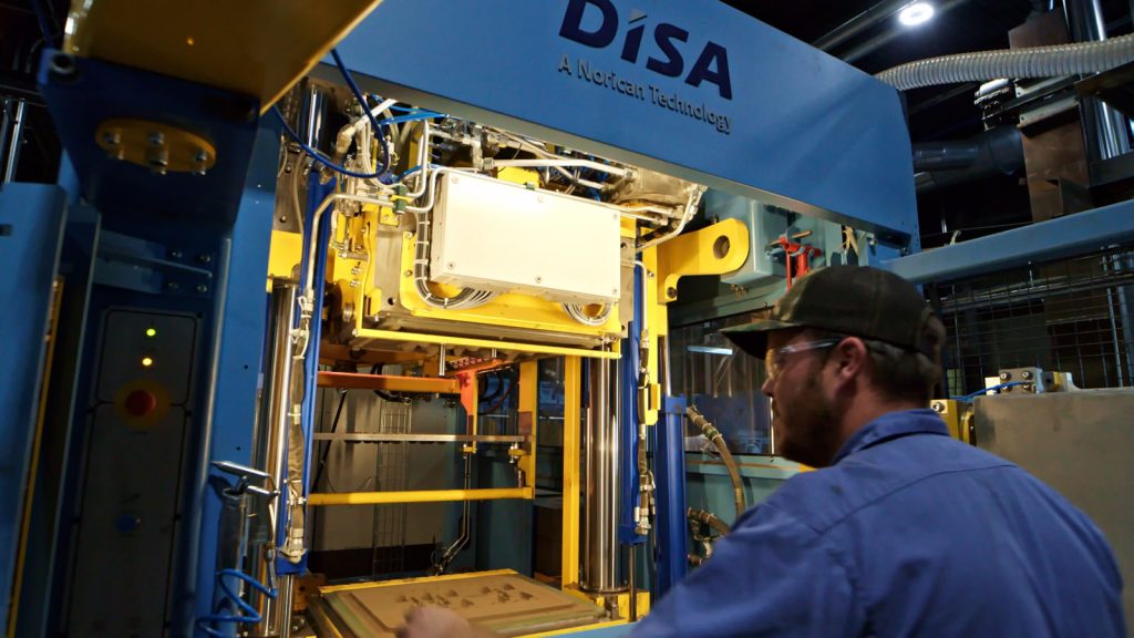 SAF Team member operating the DISA MATCH 24/28 in production at Southern Aluminum Foundry